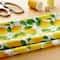 Tissu en coton à motif de citron de Loops & Threads